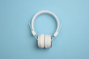 White headphones on a blue background